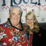Roger Van Hook (left) poses with his wife Dianne during his 2004 retirement party.