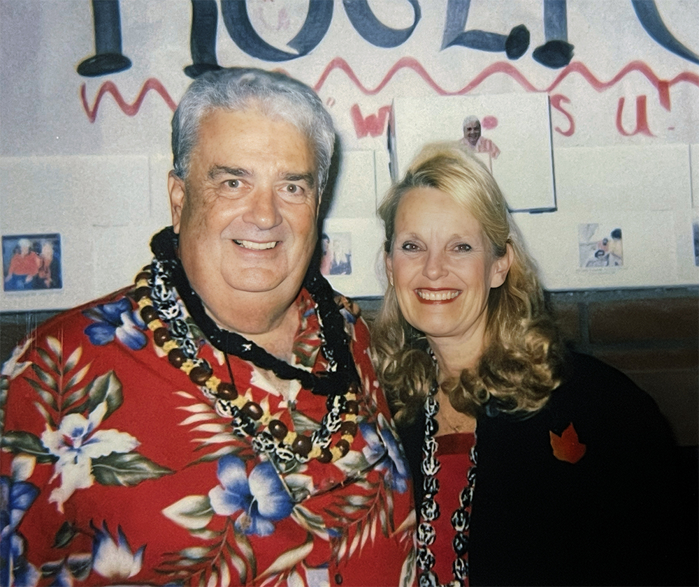 Roger Van Hook (left) poses with his wife Dianne during his 2004 retirement party.